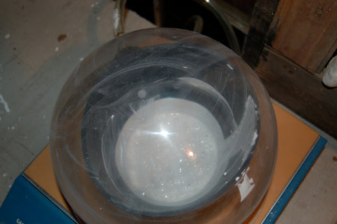 investment being vacuumed under a bell jar on a vacuum casting table