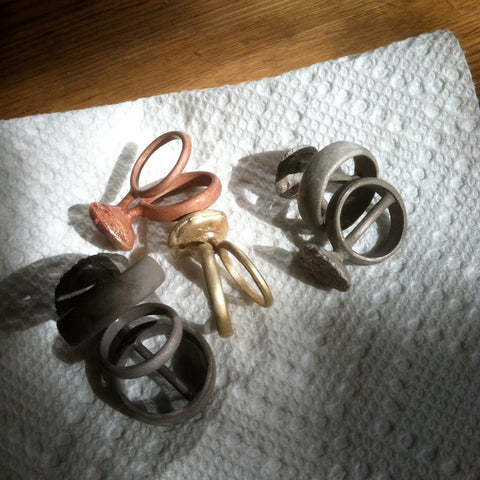 metal ring castings that have been completely cleaned during the lost wax casting jewelry making method