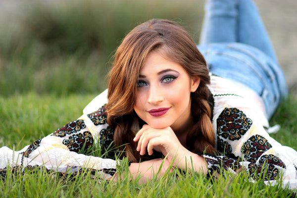 Best Mineral Makeup: Woman laying in grass