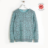 charity leopard knit sweater raising money for refugee support