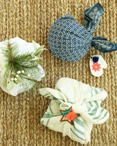 furoshiki fabric wrapped gifts with ornaments