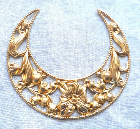 Large ornate crescent brass stamping