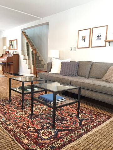 Vintage Persian rug in living room space 