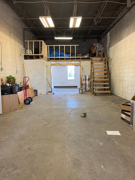 View of the studio renovation staircase + half wall progress