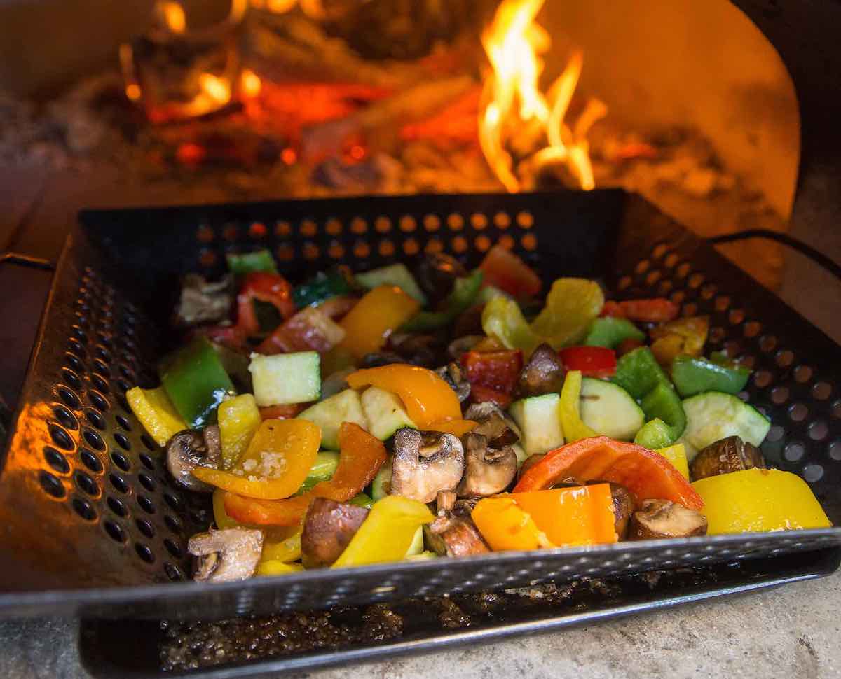 Roasting vegetables in a pizza oven