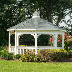 Pavilion gazebo white with flowers around it