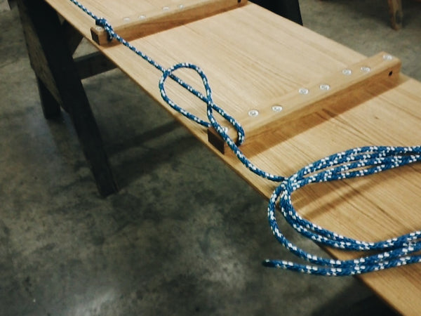 In the workshop: Length of rope lying curled on the toboggan deck