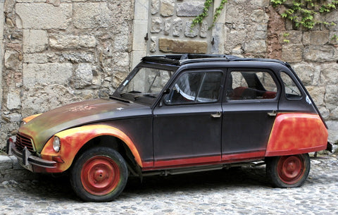 DetailNet image of faded Italian car. Automotive UV Protection