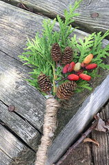 rustic wedding boutonnieres with small pine cones 