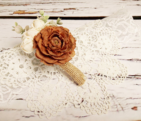 wedding boutonnieres with pine cones