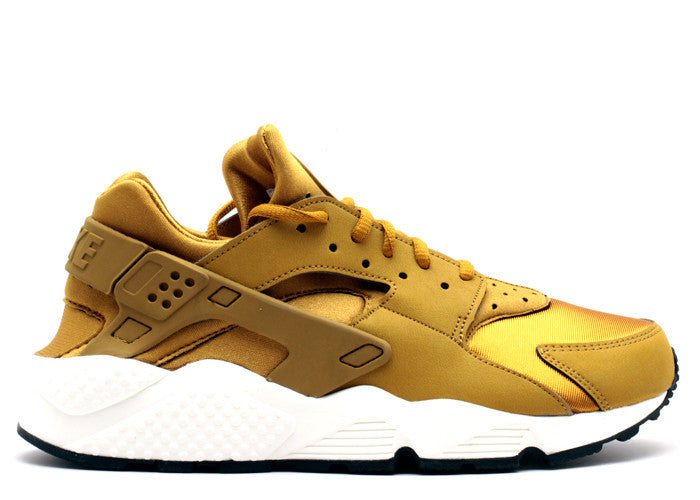 nike womens air huarache bronzine