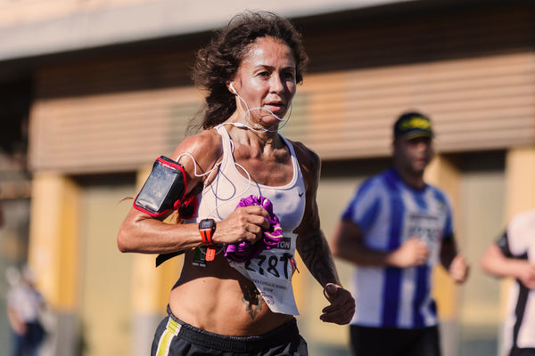 Athlete running with gadget