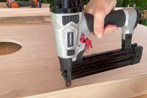 assembling diy hairpin leg cornhole board with nail gun