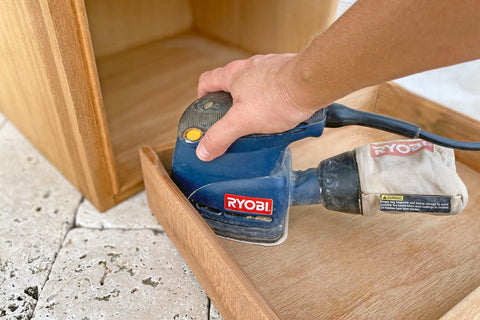 sanding inside drawer with corner cat sander