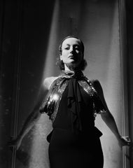 Joan Crawford in a dramatic Gilbert Adrian Evening Gown