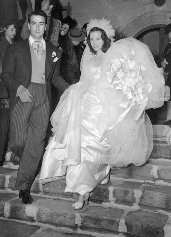 Howard Greer designed Gloria Vanderbilt's wedding dress when she married Pat diCicco in 1941