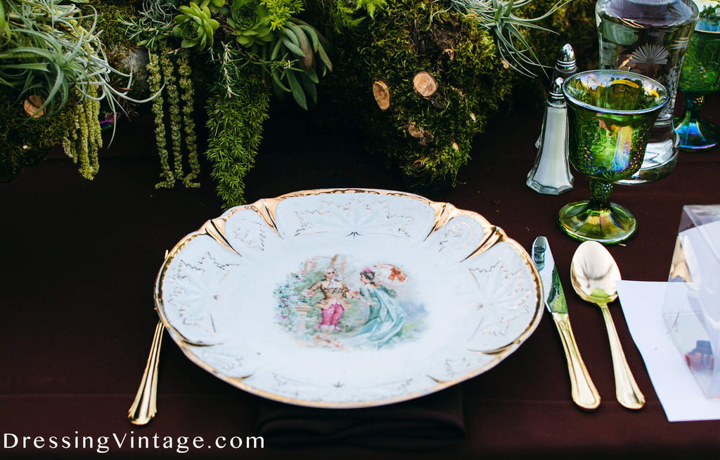 Vintage china and gold flatwear wedding table