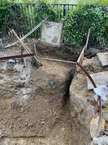 Digging place out for RDF to sit- Randy Tan Koi Pond Build