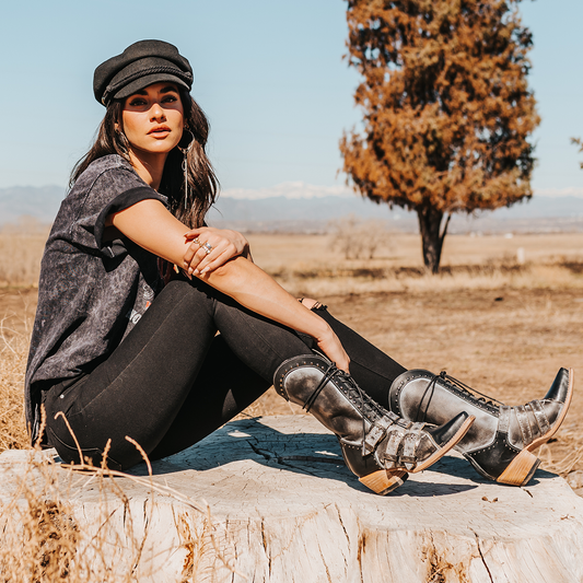 FREEBIRD women's Winnie ice multi boot featuring a lace up shaft, leather accents, and a back brass zip closure lifestyle