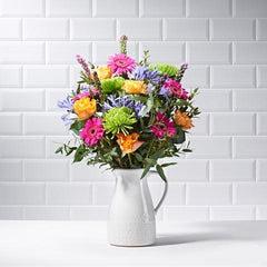 Carnival - colourful bouquet with pink, green and yellow flowers for Mother's Day