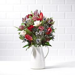 Vintage roses and red tulips for a wintery Mother's Day bouquet