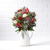Festive Dream Postabloom bouquet for Christmas | pink, red and green flowers