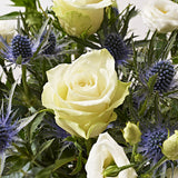 White Christmas postbaloom bouquet flowers white roses and eryngium
