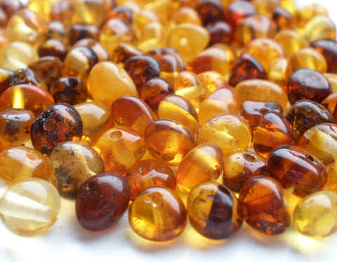 rounded baltic amber beads