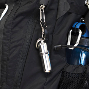 fuel canister attached to backpack