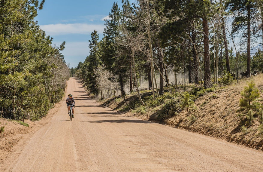 Cyclist on a gravel road in Colorado