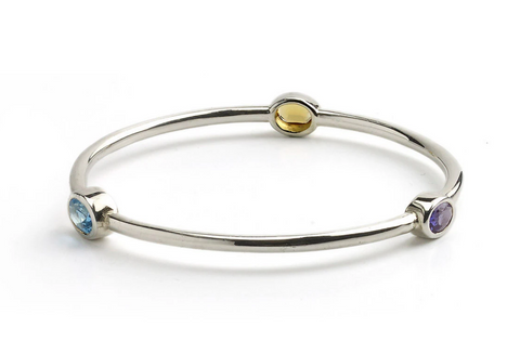 Silver bangle set with citrine, blue topaz and amethyst