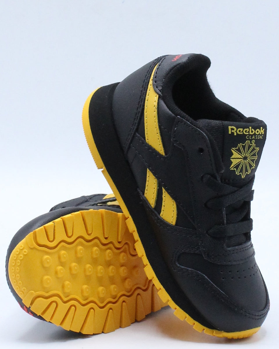 reebok yellow leather jogger shoes