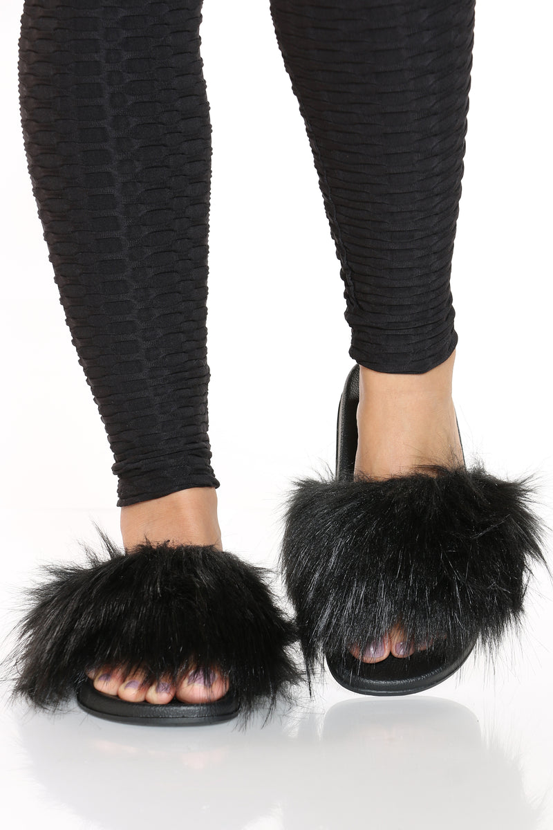 black faux fur slides