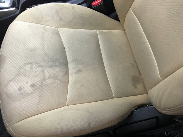 what happens without a universal seat cover - stained car seat