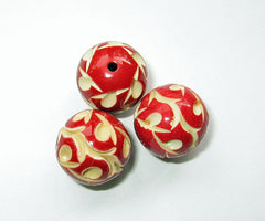 red carved celluloid beads