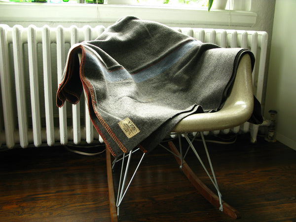 vintage blanket on vintage chair. 