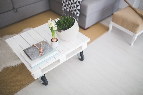Coffee table with notepad in Scandinavian decor style