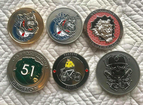 assorted TPS challenge coins