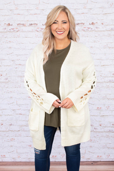 white flowy cardigan