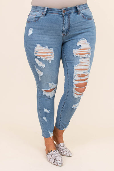 light blue ripped denim jeans