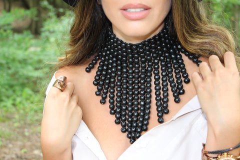 Women posing outdoors wearing Black beaded collar necklace