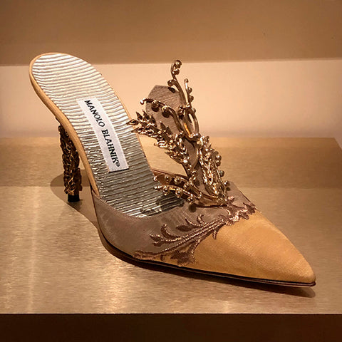 Manolo Blahnik elegant backless shoe with golden thread embroidery.