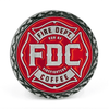 A red coin featuring Fire Department Coffee's maltese cross logo.
