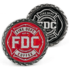 2 coins with Fire Department Coffee's maltese cross logo, one in red and the other in black.
