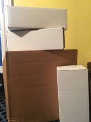 Shipping boxes of soap with Crescent Mountain Soap.
