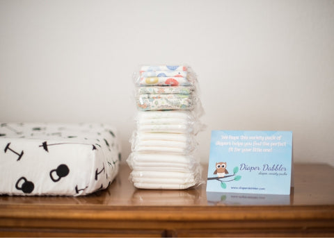 Stack of Diaper Samples with Diaper Brand Rating Card
