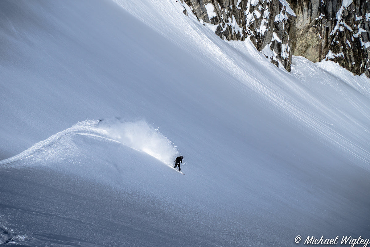 Jordan Osinchuk in pilot mode whipping up dreamy topside turns down Gray Glacier. Venture Snowboards