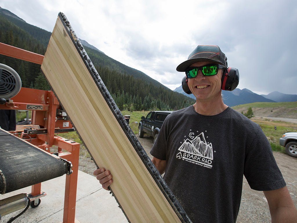 Venture's Klem Branner showing off a handcrafted snowboard core.