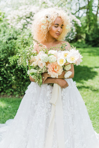 Bride Holding a Bouquet with Naturally Dyed Silk Ribbon by The Lesser Bear Photo by Ashely D Photography Florals Old Slate Farm