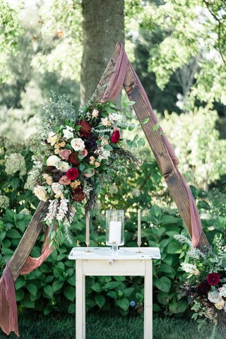 Triangular Ceremony Arch with Naturally Dyed Silk Gauze Drapery and Florals